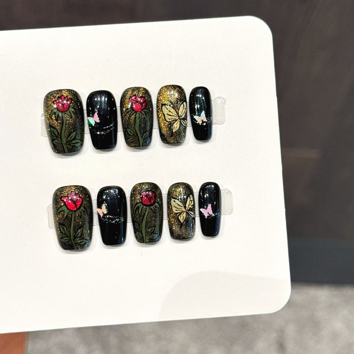 Künstlerisches Floral Press-On Nagel Set mit Glitzerakzenten