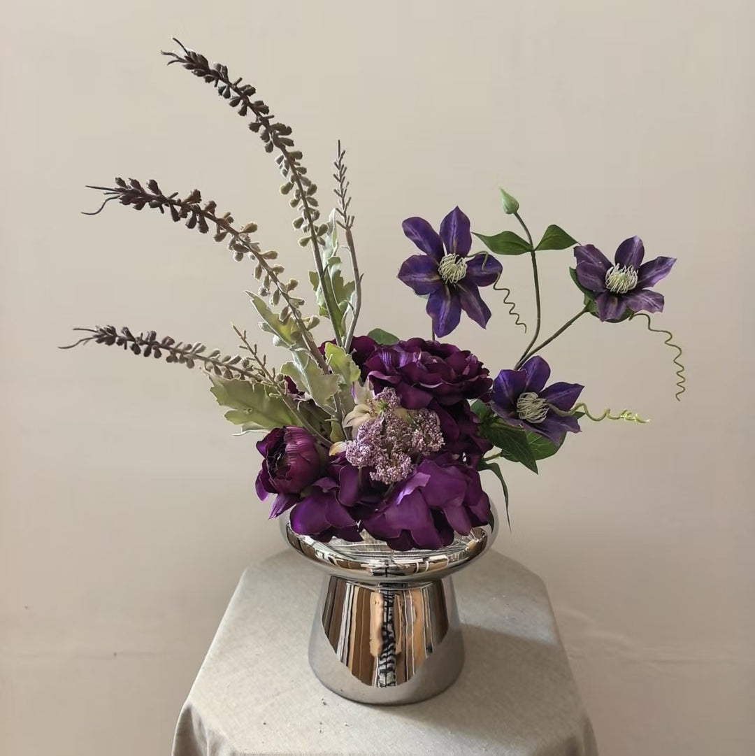 Lebensechte Blumenmittelstück Anordnung