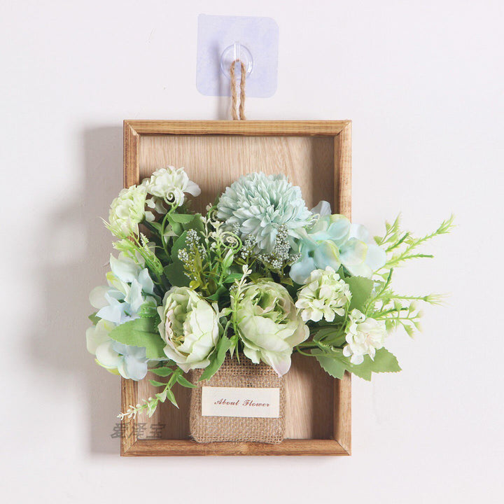 Wandmontierte dekorative florale hängende Pflanzgefäß