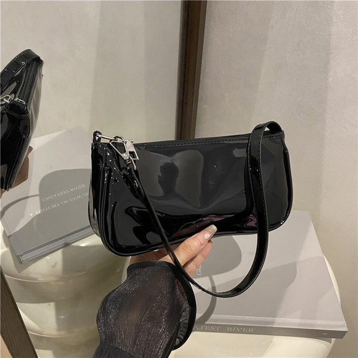 Elegante Patentleder-Clutch