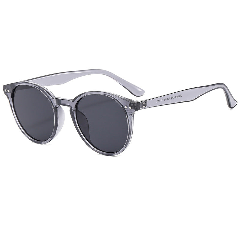 Damen modische runde Sonnenbrille mit transparentem Rahmen und UV-Schutz Karnz