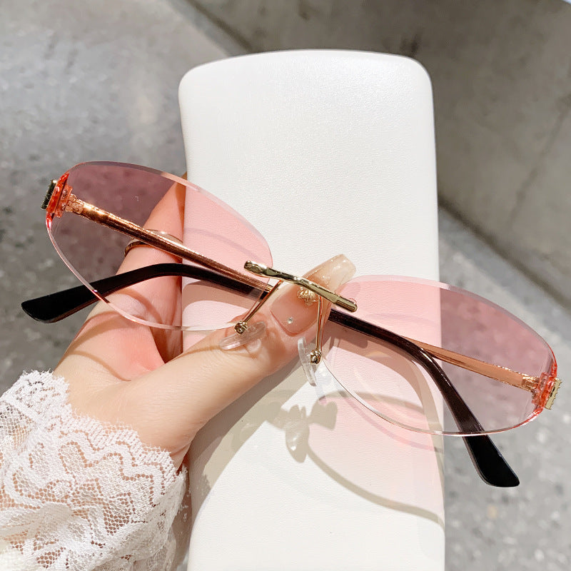 Damen Sonnenbrille im modernen Ovaldesign mit kontrastierendem Rahmen Karnz