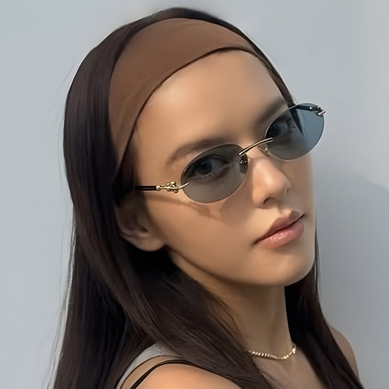 Damen ovale Sonnenbrille mit luxuriösem Metallrahmen und verspiegelten Gläsern Karnz