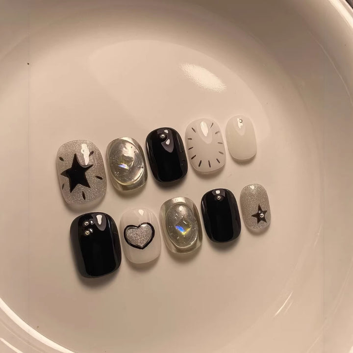 Künstlerisches Press-On-Nagelkunstset mit geometrischen und Sternmustern