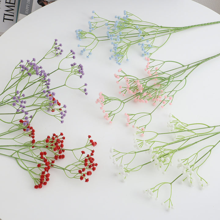 Dekorativer Kunstblütenzweig mit feinen lila Blüten Karnz