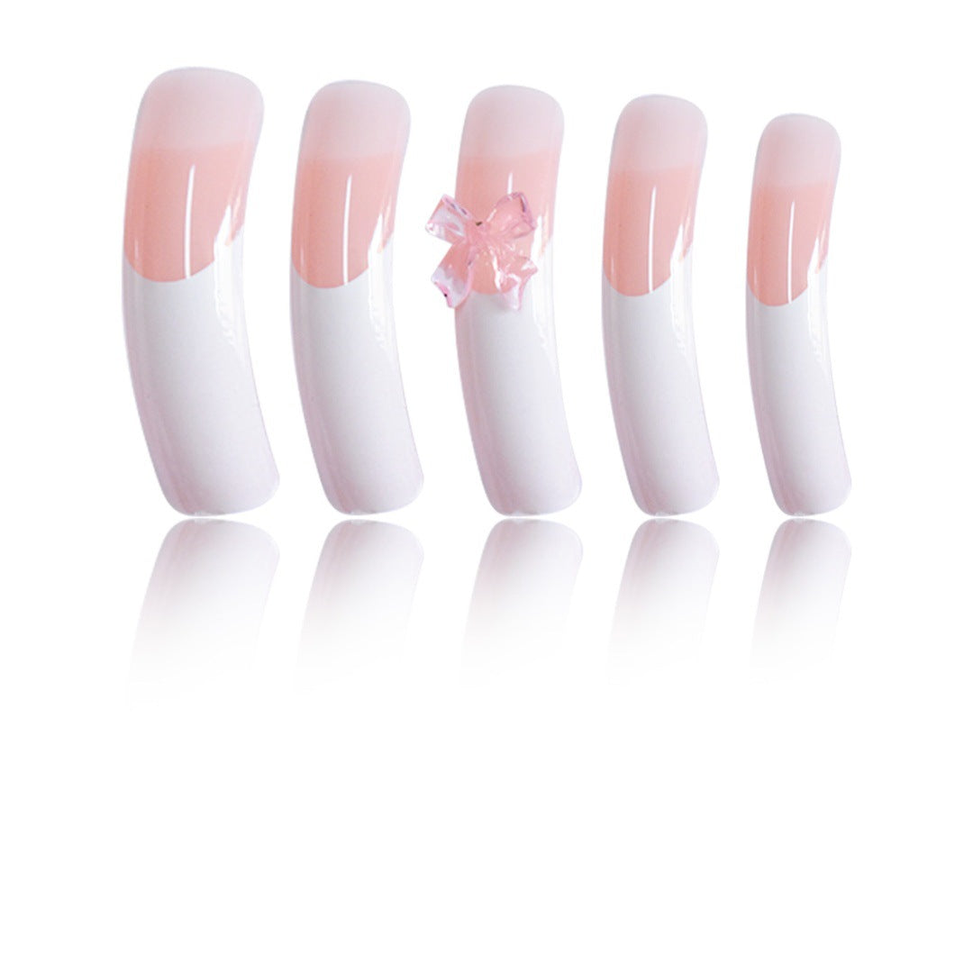 Stylische Acryl Press-On Nagelverlängerungen mit dekorativem Bogen Karnz