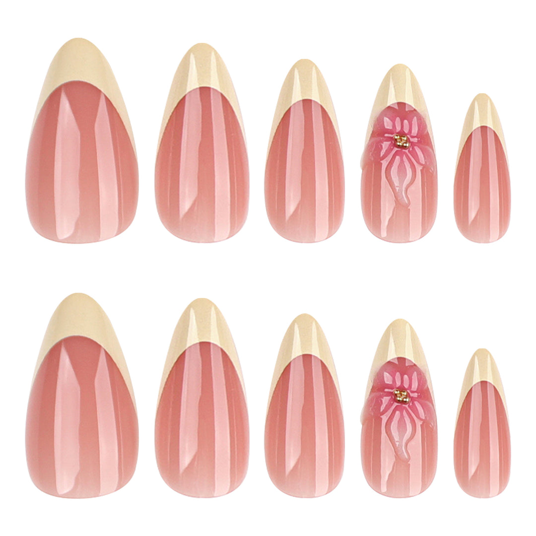 Kunstvolle Stiletto-Nägel mit elegantem Blüten-Akzent Karnz