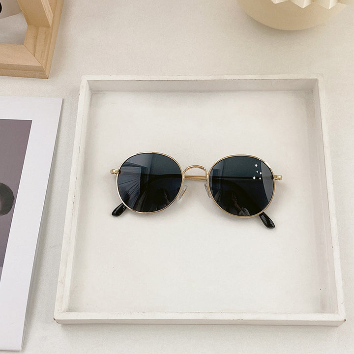 Modische Runde Sonnenbrille mit Goldener Fassung Karnz
