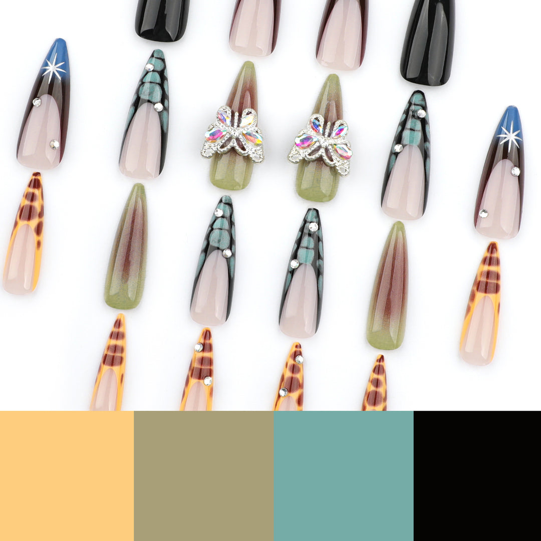 Kunstvolle Nagelverlängerungen mit eleganten Designs und Glitzer Karnz