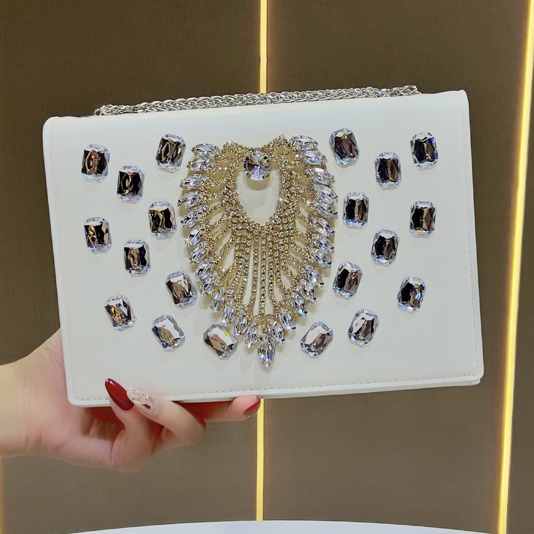 Dekorative mit Kristallen verzierte Abend-Clutch