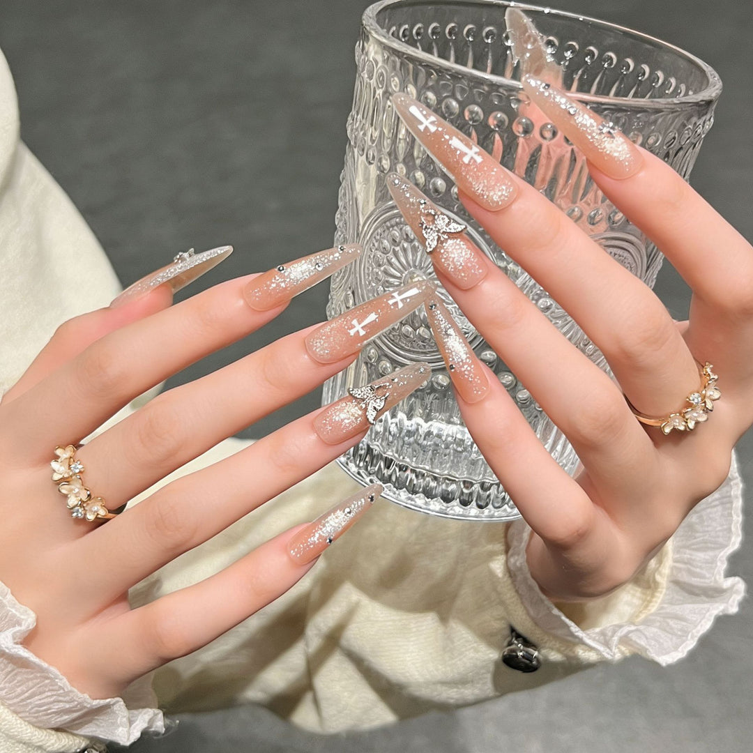 Elegante Stiletto Press-On-Nagelverlängerungen mit Edelsteinakzenten Karnz