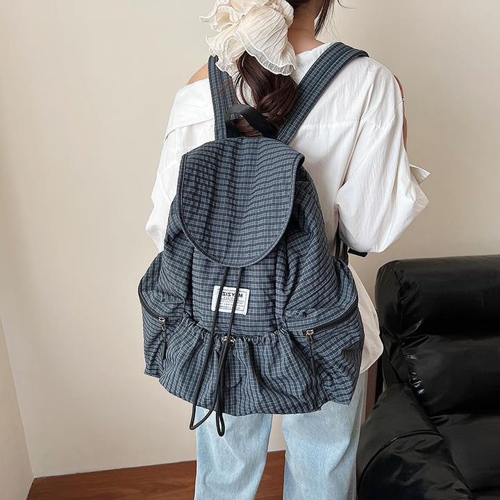 Stylische karierte Rucksack