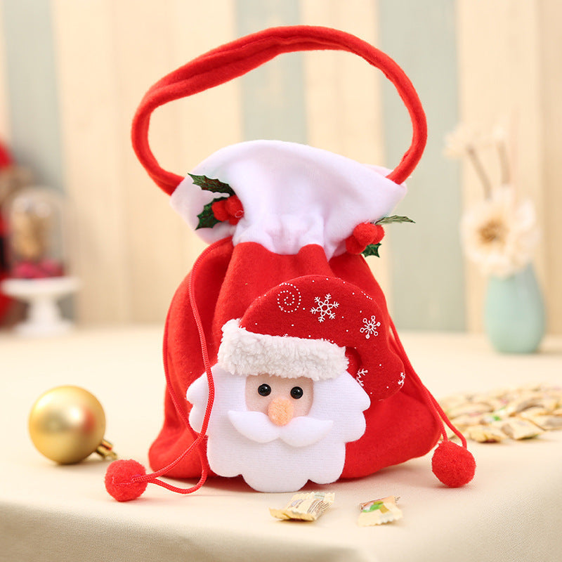 Niedlicher Weihnachtsgnom mit Geschenkesack Karnz