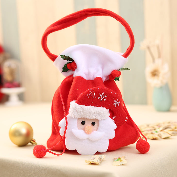 Niedlicher Weihnachtsgnom mit Geschenkesack Karnz