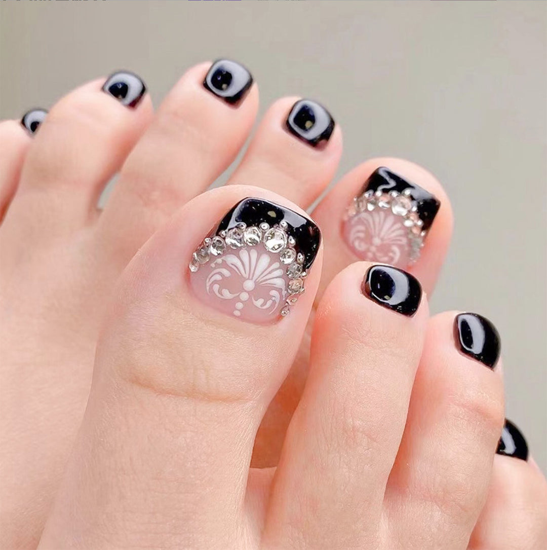 Glitzernde French Tip Zehennagelkunst