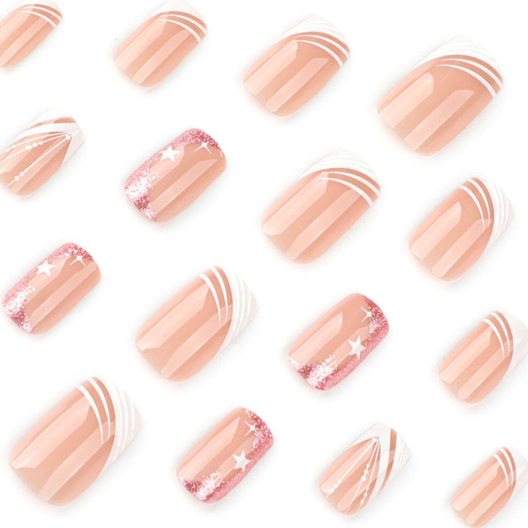 Kunstvolle Nagelverlängerungen mit Glitzer- und Sternendesign Karnz