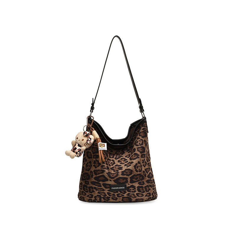 Stylische reversible Schultertasche