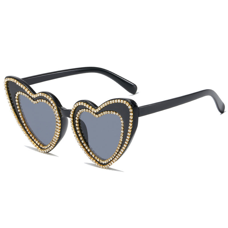 Damen Herzförmige Sonnenbrille mit Glitzerakzenten Karnz