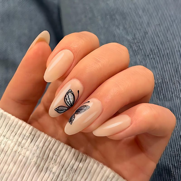 Kunstnagelset mit filigranen Schmetterlingsmotiven und elegantem Finish Karnz