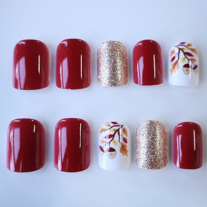 Künstlerische herbstliche Press-On Nagelkunst Karnz