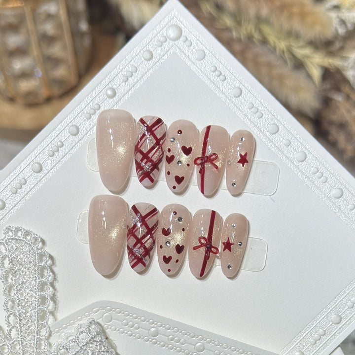 Romantisches Theme Press-On Nail Set mit Herz- und Schleifenakzenten Karnz