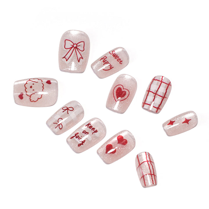 Künstliche Nagelkunst mit niedlichen Motiven Karnz