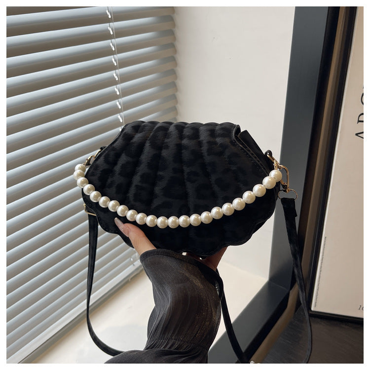 Elegante muschelförmige Umhängetasche Karnz
