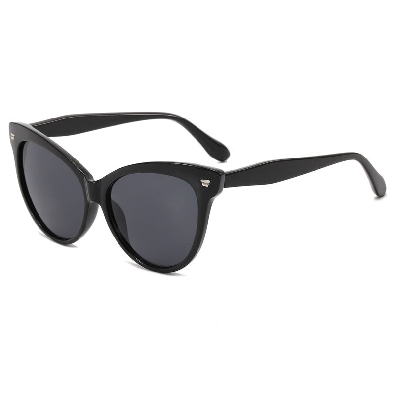 Damen modische Cat-Eye Sonnenbrille mit transparentem Rahmen und blauen Gläsern Karnz