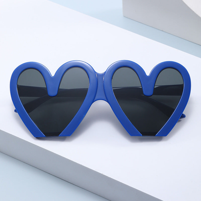 Damen Herzförmige Sonnenbrille mit auffälligem Design Karnz
