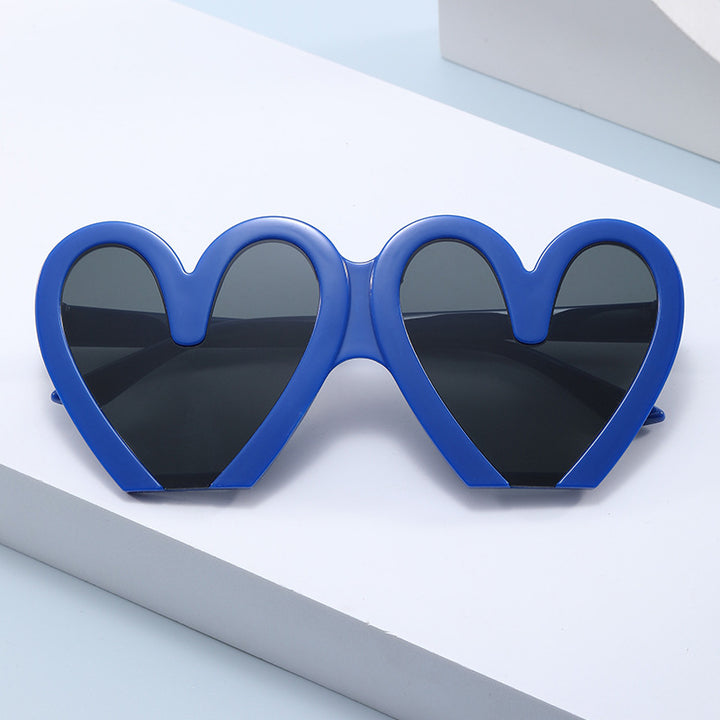 Damen Herzförmige Sonnenbrille mit auffälligem Design Karnz