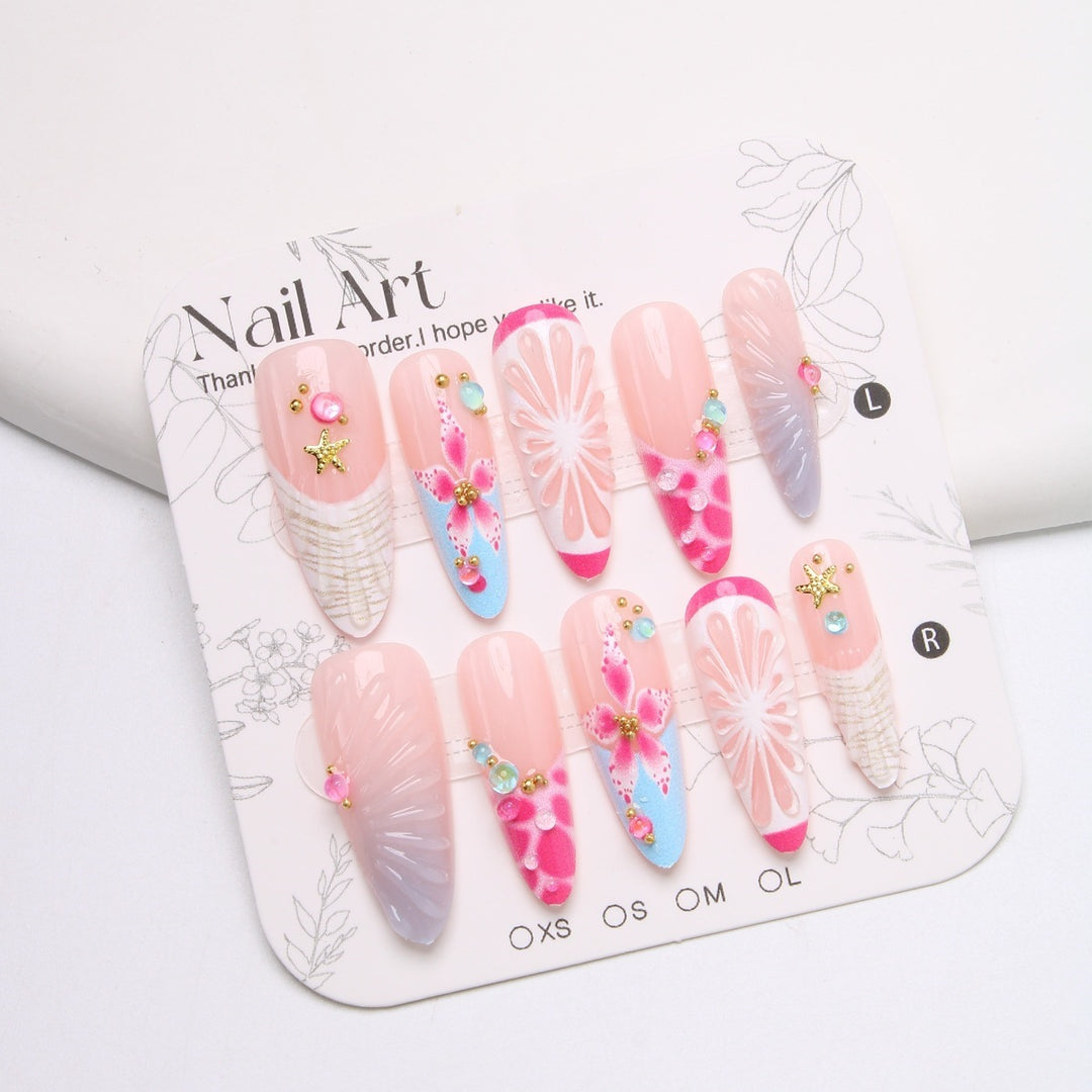Kunstnagelset mit floralem und fröhlichem Design Karnz