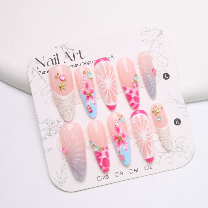 Kunstnagelset mit floralem und fröhlichem Design Karnz