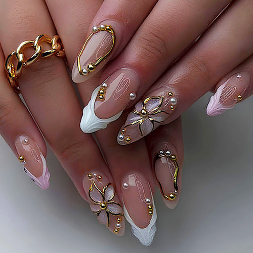 Dekorativer Press-On Nagelset mit floralen Designs Karnz