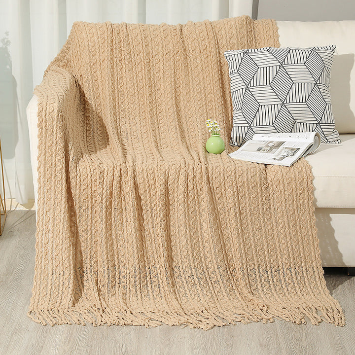 Strukturierte Strickwurfdecke