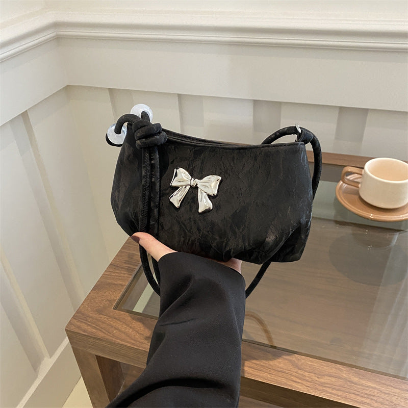 Elegante Tasche mit Schleifendetail