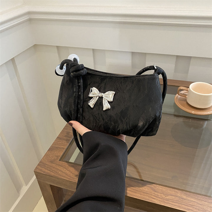 Elegante Tasche mit Schleifendetail