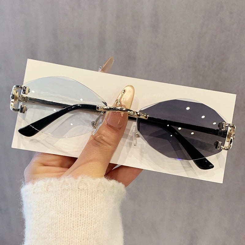 Damen futuristische Sonnenbrille mit auffälligem Hexagonalrahmen und hochwertigen Glitzerakzenten Karnz