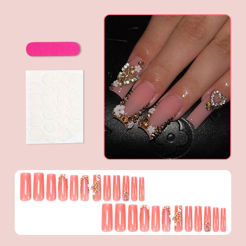 Kunstnagelset mit glamourösen 3D-Verzierungen und elegantem Design Karnz