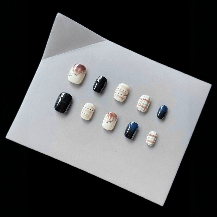 Künstlerisches Press-On Nagelset mit abstraktem Marmor Design