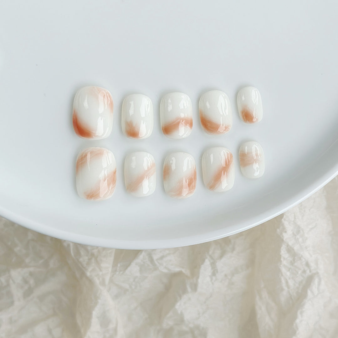 Künstlerisches Press-On Nagelset mit marmoriertem Design