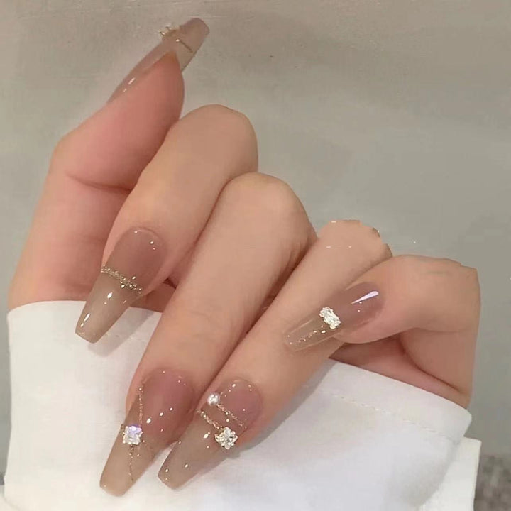 Elegantes Press-On Nagelkunstset mit Kristallverzierungen
