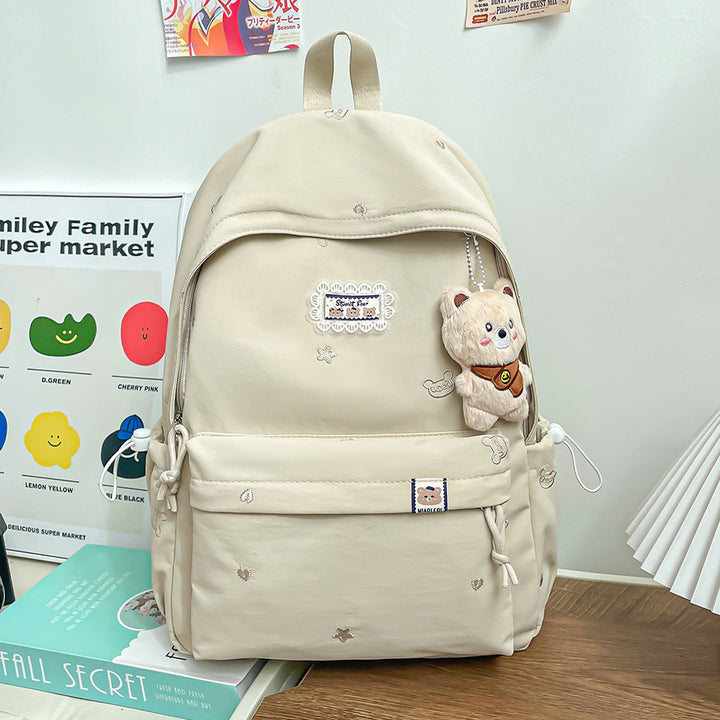 Stylischer backpack mit floralem Schmuck Karnz