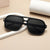 Damen Modische quadratische Sonnenbrille mit robustem Rahmen Karnz