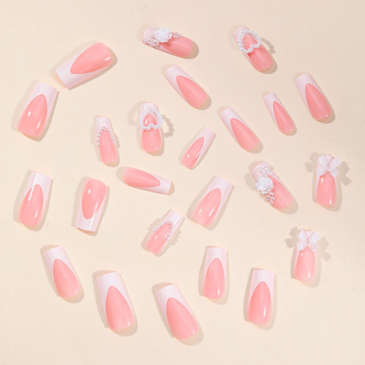 Exquisite 3D Blumendekor und mit Schmucksteinen verzierte Nagelverlängerungen Karnz