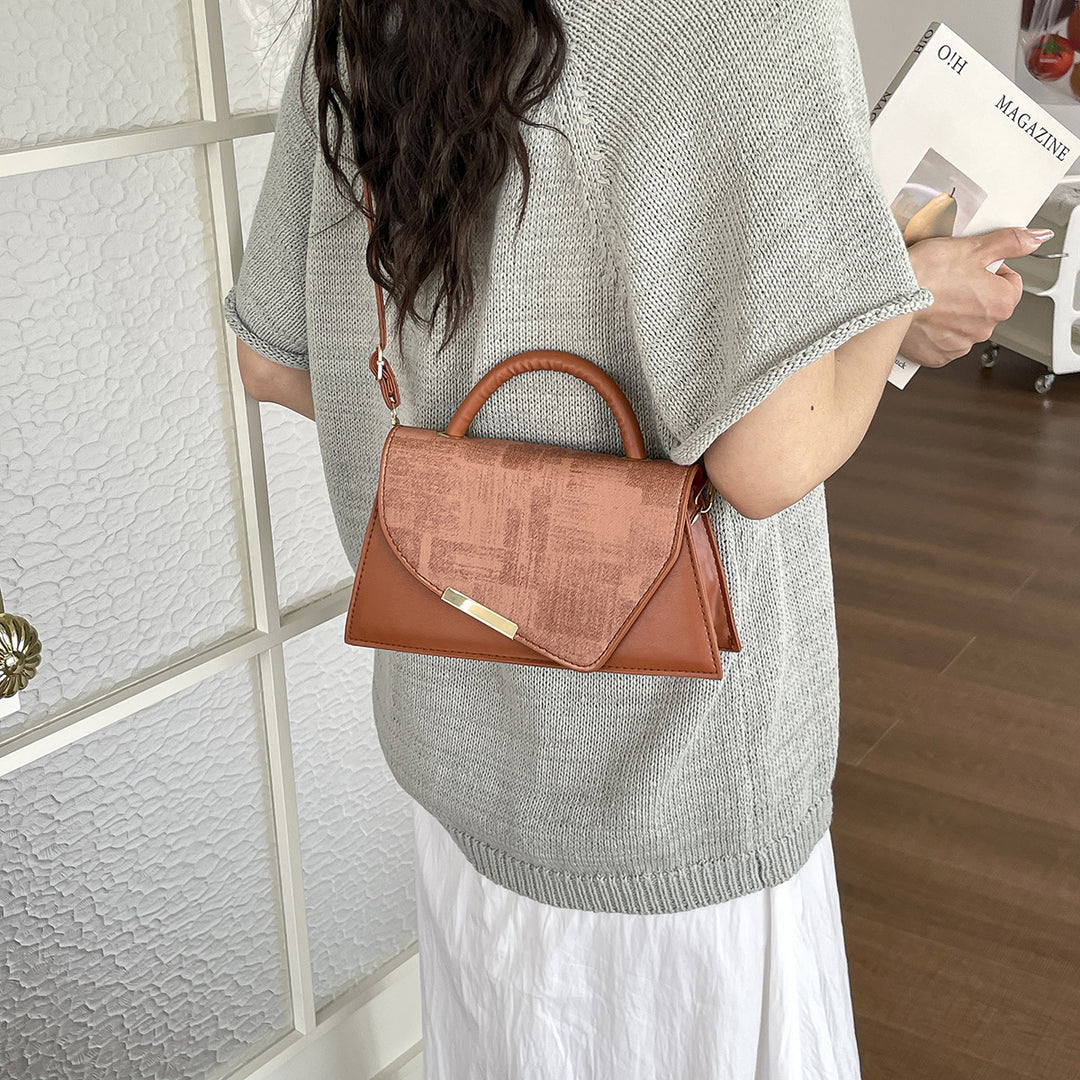 Elegantly strukturiert Handtasche