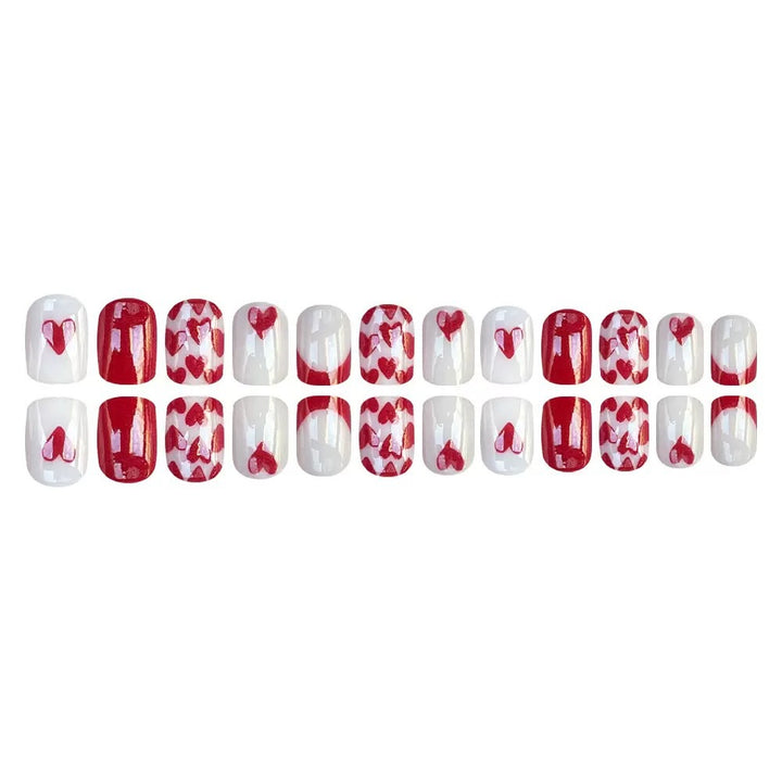 Kunstnagelset mit romantischen Herzmotiven und elegantem Glanz Karnz