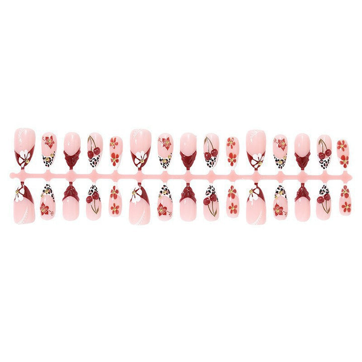 Kreatives Kunstnagelset mit floralen und tierischen Motiven Karnz