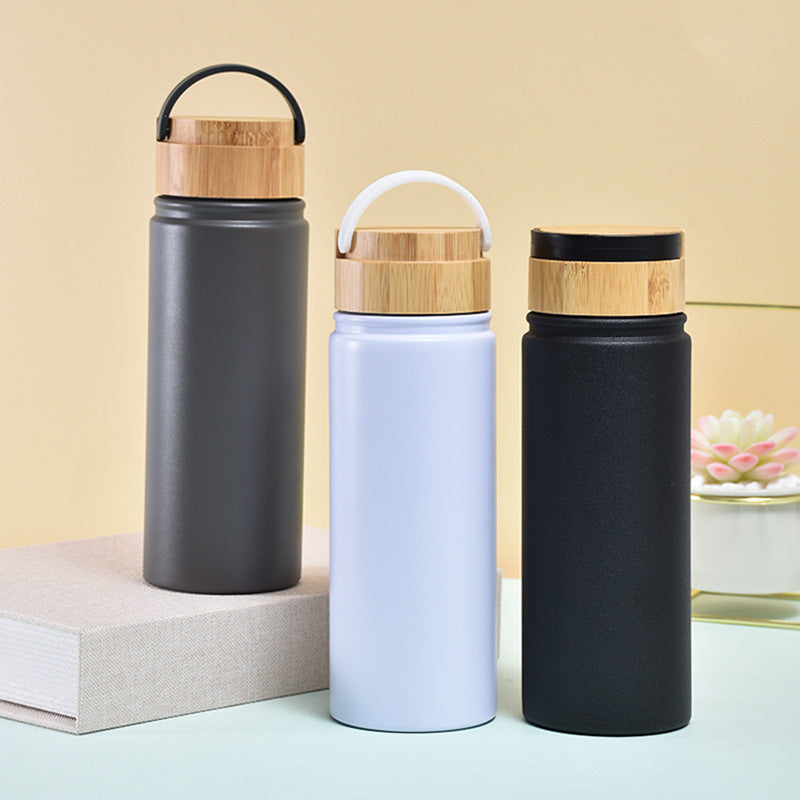 Damen stilvolle und vielseitige Edelstahl Trinkflasche mit Bambusverschluss Karnz