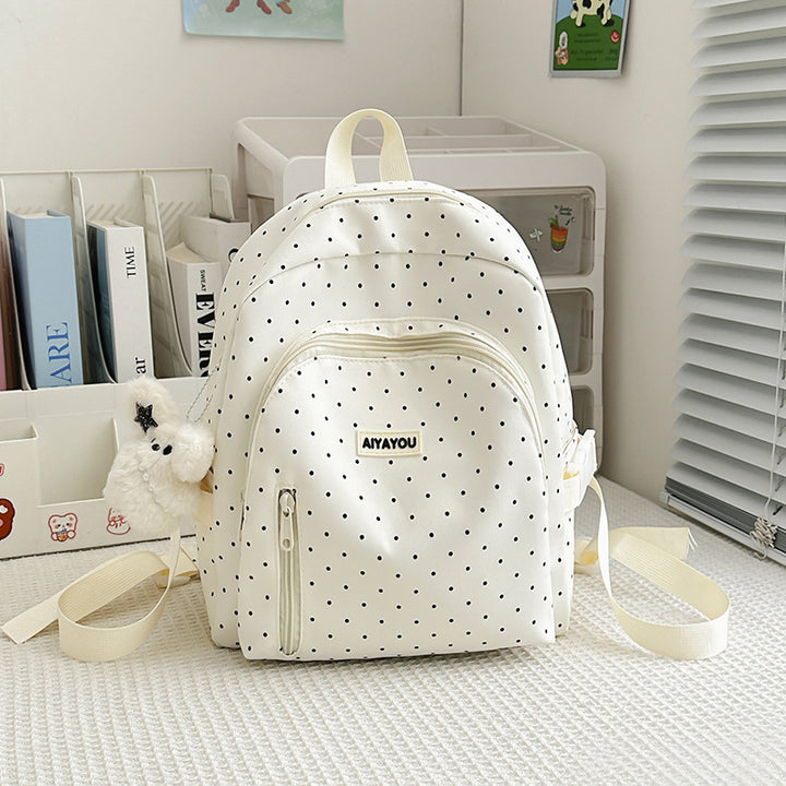 Charmanter gepunkteter Rucksack