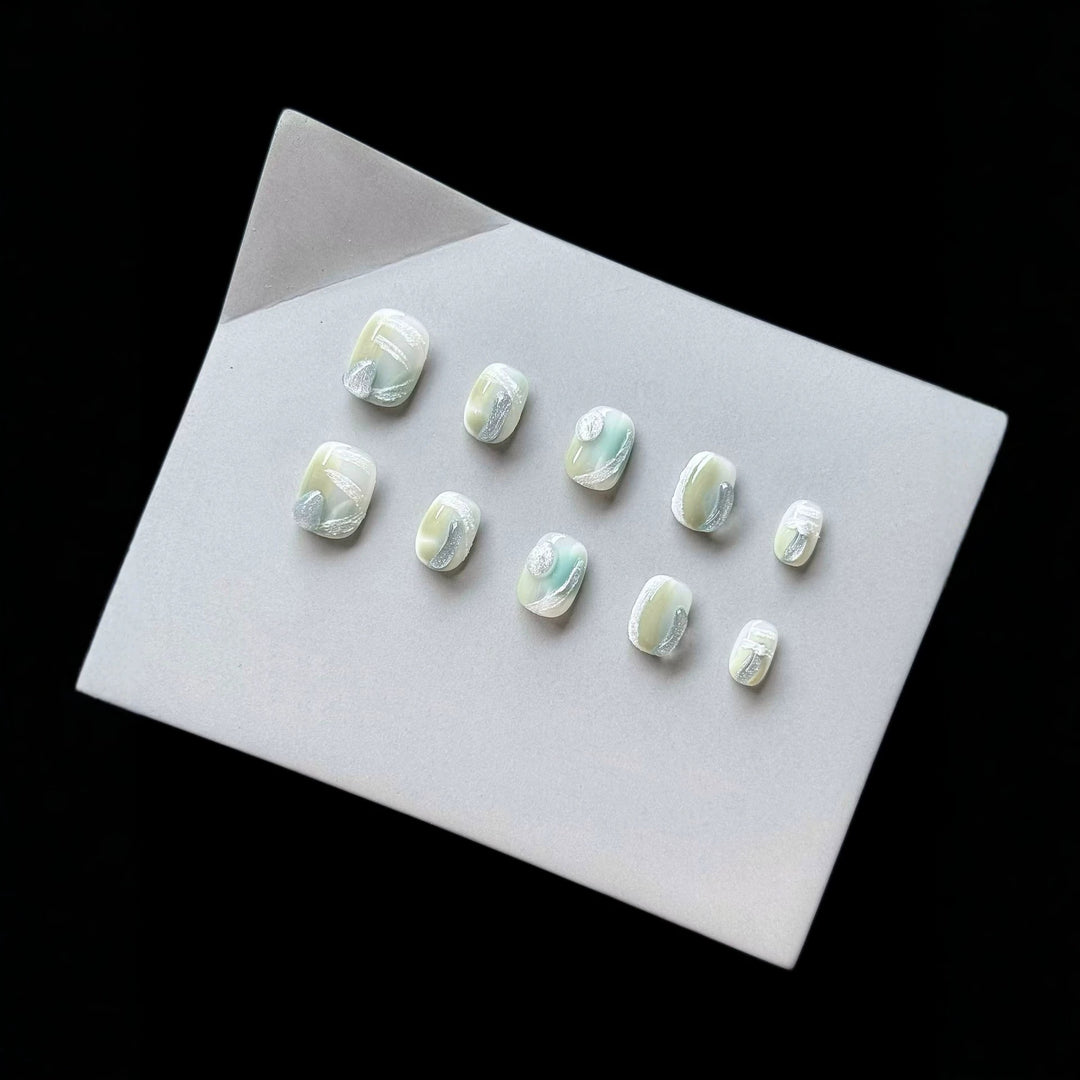 Künstlerisches Press-On-Nagelset mit glänzendem Marmor-Design